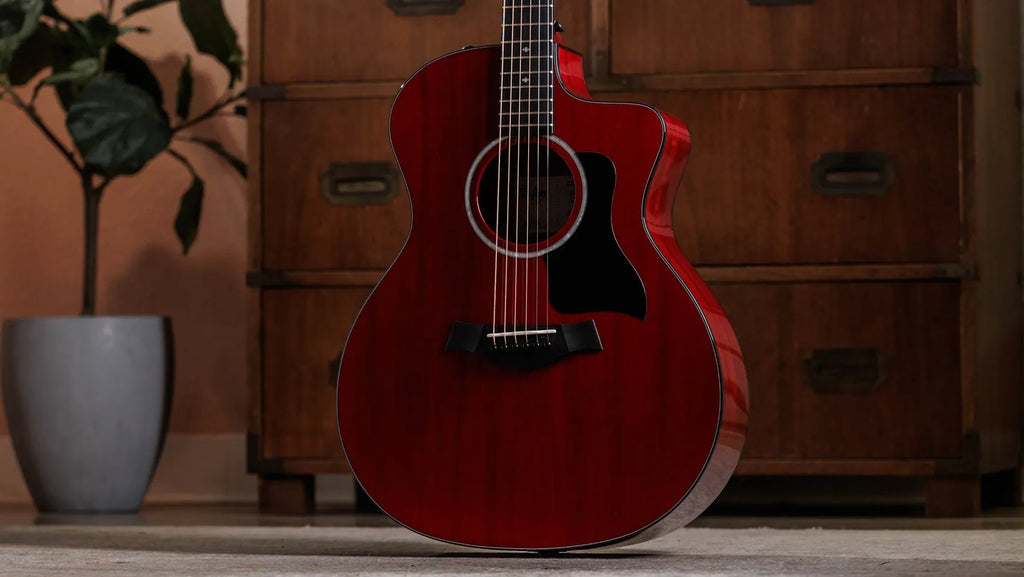 Đàn Guitar Acoustic Taylor 224ce Plus Special Edition - Thu hút mọi ánh nhìn từ mọi góc độ người yêu guitar  Đàn guitar acoustic-electric Taylor 224ce Special Edition kết hợp vẻ ngoài nổi bật, chất liệu gỗ cao cấp và tay nghề chế tác danh tiếng của Taylor để tạo nên một nhạc cụ vừa cuốn hút về mặt thẩm mỹ, vừa ấn tượng về âm thanh. Sở hữu dáng đàn Grand Auditorium cùng Venetian cutaway, mẫu đàn này được chế tác với mặt top gỗ neo-tropical mahogany nguyên tấm kết hợp lưng và hông gỗ sapele ép nhiều lớp, mang đến chất âm ấm áp, giàu âm gỗ (woody) cùng độ nén tự nhiên giúp làm mượt các sắc thái khi chơi. Lớp sơn bóng Trans Red Gloss tôn lên vân gỗ tự nhiên đầy nổi bật, trong khi hệ thống C-Class Bracing cải thiện độ ngân và tăng cường dải trầm mạnh mẽ. Kết hợp cùng hệ thống điện tử Taylor Expression System 2 (ES2), cây đàn mang lại hiệu suất tuyệt vời cả khi chơi mộc lẫn biểu diễn qua ampli. Với âm thanh cân bằng, cảm giác chơi mượt mà và lớp hoàn thiện rực rỡ, 224ce Special Edition là một trong những mẫu đàn nổi bật trong bộ sưu tập của Taylor.  Đàn Guitar Acoustic Taylor 224ce Plus Special Edition - Trans Red  Đàn guitar acoustic-electric với mặt top gỗ Neo-Tropical Mahogany  Mặt đàn được chế tác từ gỗ neo-tropical mahogany nguyên tấm mang đến chất âm giàu trung âm, ấm áp và rõ nét, rất phù hợp với những người chơi yêu thích âm thanh dày, cân bằng và giàu cảm xúc. Đặc tính âm học tự nhiên của mahogany tạo ra độ nén nhẹ, giúp kiểm soát tốt những cú gảy mạnh và mang lại phản hồi mượt mà, ổn định. Trong khi đó, lưng và hông gỗ sapele ép nhiều lớp bổ sung thêm chiều sâu và độ đầy đặn cho âm sắc, tạo nên chất âm cân bằng, rõ ràng nhưng vẫn mạnh mẽ. Sự kết hợp này còn giúp cây đàn duy trì chất lượng âm thanh ổn định theo thời gian, đáp ứng tốt nhu cầu biểu diễn và luyện tập lâu dài.  Hệ thống C-Class Bracing tăng cường dải trầm và độ ngân  Taylor 224ce Special Edition được trang bị C-Class Bracing, biến thể của thiết kế V-Class Bracing nổi tiếng của Taylor, được tối ưu riêng cho dáng đàn Grand Auditorium. Hệ thống thanh giằng tiên tiến này giúp tăng cường độ ngân (sustain) và khả năng truyền âm (projection), đồng thời nhấn mạnh dải trầm để mang đến âm thanh đầy đặn và giàu năng lượng hơn. Kết quả là phổ âm cân bằng hơn, mỗi nốt nhạc đều vang lên rõ ràng với độ ngân tự nhiên. Dù chơi fingerstyle hay đệm hợp âm, C-Class Bracing đều mang lại phản hồi phong phú và linh hoạt, giúp cây đàn phát huy tối đa khả năng biểu diễn.  Hệ thống điện tử Taylor ES2 tái tạo âm thanh trung thực  Hệ thống Taylor Expression System 2 (ES2) tái hiện trung thực đặc tính âm thanh tự nhiên của Taylor 224ce Special Edition với độ chính xác cao. Thiết kế cảm biến đặt phía sau ngựa đàn sử dụng ba cảm biến piezo được hiệu chỉnh riêng, cho phép thu trọn dải tần và sắc thái âm thanh của cây đàn khi kết nối với ampli hoặc hệ thống âm thanh. Bộ điều khiển tích hợp bao gồm Volume, Bass, Treble chủ động cùng công tắc đảo pha (Phase Switch) giúp giảm hiện tượng hú rít khi biểu diễn trực tiếp. Dù biểu diễn trên sân khấu hay thu âm trong phòng thu, ES2 đều mang đến âm thanh khuếch đại tự nhiên, sống động và giàu chi tiết.  Cấu trúc bền bỉ với các chi tiết cao cấp  Taylor 224ce Special Edition được chế tác với sự kết hợp giữa độ bền và tính thẩm mỹ. Cần đàn bằng gỗ neo-tropical mahogany có lớp hoàn thiện satin mịn giúp tạo cảm giác cầm nắm thoải mái trong thời gian dài. Mặt phím và ngựa đàn bằng gỗ mun Tây Phi (West African Ebony) góp phần tăng độ rõ nét, khả năng truyền rung và sustain của cây đàn. Bộ khóa lên dây Satin Black hoạt động ổn định, giữ dây chuẩn trong suốt quá trình biểu diễn. Lược ngựa Micarta và lược đàn Nubone giúp cải thiện độ chính xác của cao độ và tăng khả năng cộng hưởng. Bên cạnh đó, lớp sơn Trans Red Gloss không chỉ tạo nên vẻ ngoài nổi bật mà còn bảo vệ bề mặt gỗ, giúp cây đàn luôn bền đẹp theo thời gian.  Cây đàn acoustic-electric lý tưởng cho sân khấu và phòng thu  Taylor 224ce Special Edition là lựa chọn tuyệt vời dành cho những nghệ sĩ mong muốn sở hữu một cây đàn vừa nổi bật về ngoại hình, vừa mạnh mẽ về hiệu năng. Dáng đàn Grand Auditorium mang lại cảm giác chơi thoải mái và linh hoạt, trong khi mặt top mahogany nguyên tấm kết hợp cùng C-Class Bracing tạo nên chất âm ấm áp, giàu nội lực với dải trầm được tăng cường rõ rệt. Dù biểu diễn trực tiếp trên sân khấu hay thu âm trong phòng thu, cây đàn đều mang đến khả năng chơi xuất sắc cùng âm thanh truyền cảm, khơi nguồn cảm hứng cho mọi phong cách âm nhạc.  Đặc điểm nổi bật của Taylor 224ce Plus Special Edition:  Mặt top gỗ Neo-Tropical Mahogany nguyên tấm mang đến âm thanh ấm áp với độ nén tự nhiên, giúp các sắc thái biểu diễn trở nên mượt mà và cân bằng. Lưng và hông gỗ Sapele ép nhiều lớp đảm bảo độ bền cao, đồng thời duy trì chất lượng âm thanh ổn định theo thời gian. Hệ thống C-Class Bracing tăng cường độ cộng hưởng và độ ngân (sustain), tạo nên âm thanh acoustic đầy đặn và giàu nội lực. Hệ thống điện tử Expression System 2 (ES2) mang đến âm thanh khuếch đại chuyên nghiệp với độ trung thực và độ rõ nét cao. Thiết kế Venetian Cutaway giúp người chơi dễ dàng tiếp cận các phím cao, tăng tính linh hoạt khi biểu diễn các kỹ thuật nâng cao. Mặt phím gỗ mun Tây Phi (Genuine West African Ebony) mang lại cảm giác bấm phím mượt mà cùng độ bền vượt trội. Lớp sơn Trans Red tạo điểm nhấn nổi bật với khả năng tôn lên vẻ đẹp tự nhiên của vân gỗ. Bộ khóa lên dây Taylor Satin Black đảm bảo khả năng giữ dây ổn định, đồng thời mang đến vẻ ngoài hiện đại và sang trọng. Lược đàn Nubone và lược ngựa Micarta giúp cải thiện độ chính xác của cao độ, đồng thời tăng khả năng truyền rung của dây đàn. Brown AeroCase bảo vệ đàn an toàn với trọng lượng nhẹ, thuận tiện cho việc di chuyển và cất giữ. Thông số kỹ thuật/ Spec:  BODY  Body type: Taylor Grand Auditorium Cutaway: Venetian Top wood: Neo-tropical mahogany Back and sides: Sapele Bracing pattern: C-Class Body finish: Trans Red Gloss  NECK  Neck shape: Standard Taylor profile Nut width: 1.6875" (42.8625 mm) Fingerboard: Genuine West African ebony Neck wood: Neo-tropical mahogany Scale length: 25.5" (647.7 mm) Number of frets: 20 Neck finish: Satin  ELECTRONICS  Pickup/preamp: Expression System 2 professional-audio-grade Brand: Taylor Configuration: Behind-the-saddle transducer with adjustable sensors Preamp EQ: Volume active bass and treble Feedback filter: Onboard phase switch Tuner: No  HARDWARE  Headstock overlay: Genuine West African ebony Tuning machines: Taylor satin black with satin black buttons Bridge: Genuine West African ebony Saddle and nut: Micarta and Nubone white Special features: Trans red finish  OTHER  Case: Brown AeroCase Country of origin: Mexico Number of strings: 6 Orientation: Right handed